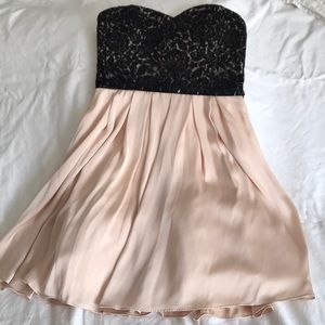 Black lace and pink satin strapless dress
